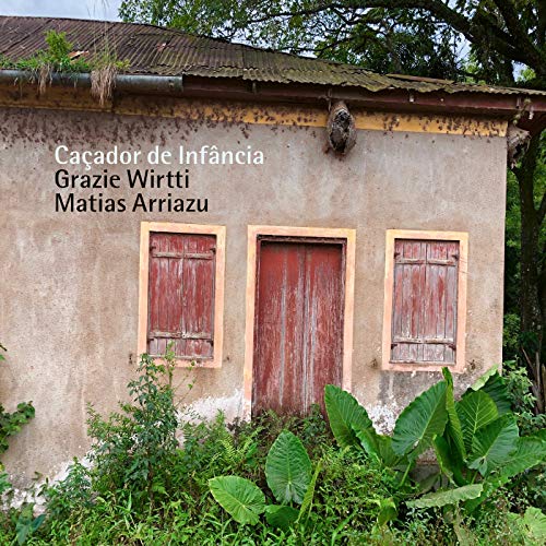 "Album cover featuring a weathered building with red doors, surrounded by lush greenery."