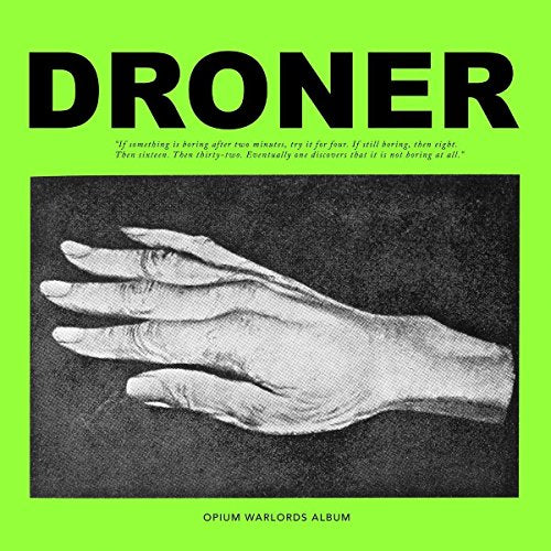 Vinyl album cover with green background, black text, and a black-and-white hand image.