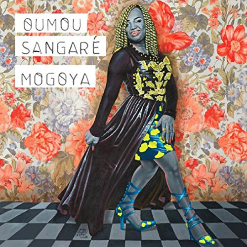 Vinyl album cover featuring a woman in a black dress against a floral background.