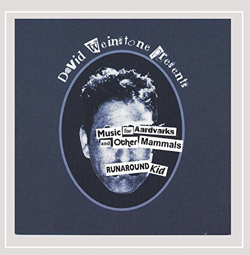 "Album cover with a blue background and a man's face in an oval frame."