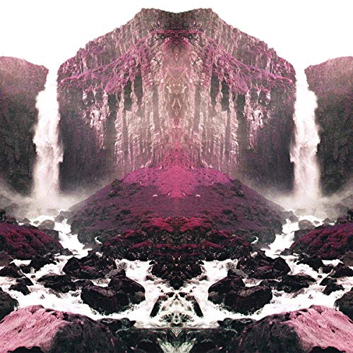 A mirrored image of a waterfall, with pinkish-purple hues and rocky foreground.