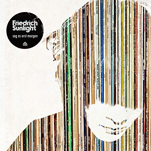 Album cover with a silhouette of a person surrounded by vinyl records.