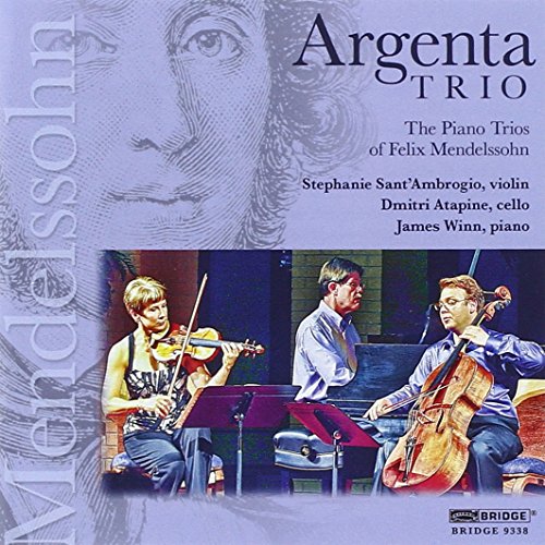 "CD cover featuring three musicians playing instruments with a blue background and portrait."