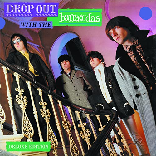 CD cover featuring four men in suits on a staircase.