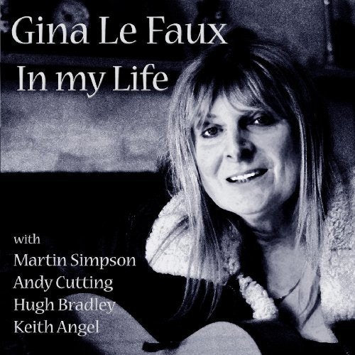 Black and white album cover with a smiling woman holding a guitar.