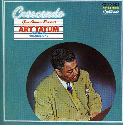 "CD cover featuring a man in a yellow suit playing piano, teal background."