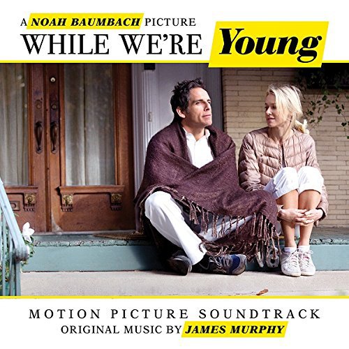 "CD cover with man and woman sitting on steps, film title and composer credited."