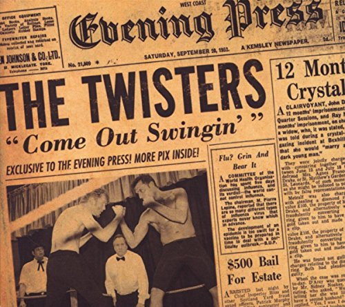 Vintage newspaper clipping with "THE TWISTERS" headline and wrestling match photo.