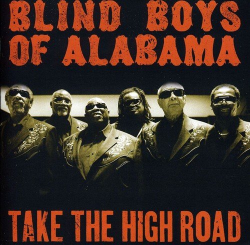 Album cover with six men in suits and sunglasses against a black background.