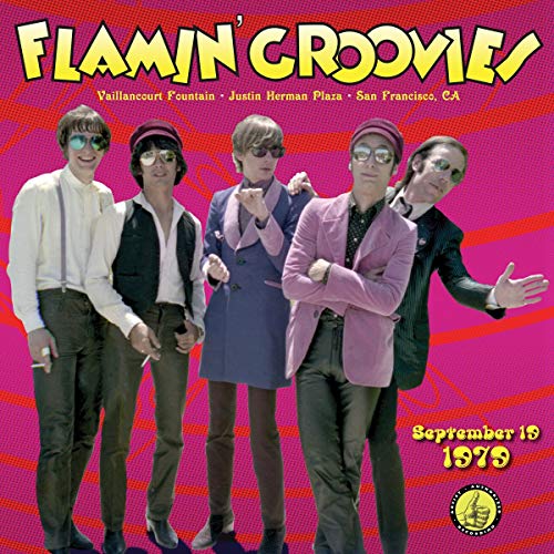 Album cover featuring five men in 1970s attire, pink and white background.