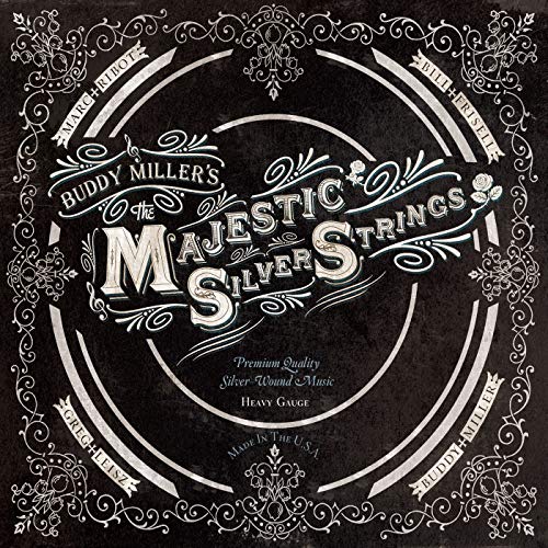 Black and white ornate packaging for "Buddy Miller's Majestic Silver Strings" guitar strings.