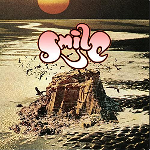 CD cover: "Smile" text over a rocky coast and ocean scene.