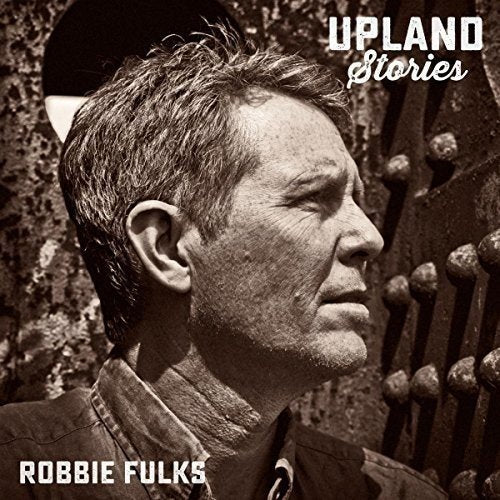 Sepia-toned album cover featuring a man's profile with "Upland Stories" and "Robbie Fulks" text.