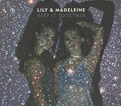 Album cover featuring silhouettes of two women against a sparkly, starry background.