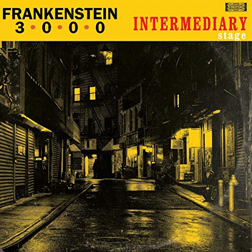 Yellow album cover depicts a dark, narrow city street at night.