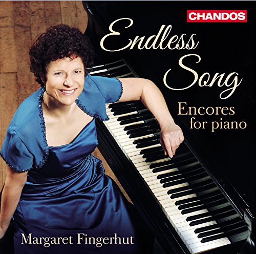 "CD cover featuring a woman in blue dress leaning on a piano."