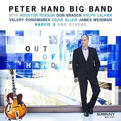 Album cover: man in suit, guitar, and "Out of Hand" text on blue background.
