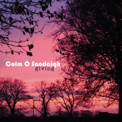 CD cover for Colm O’Snodaigh’s “Giving” with a pink and purple sunset.