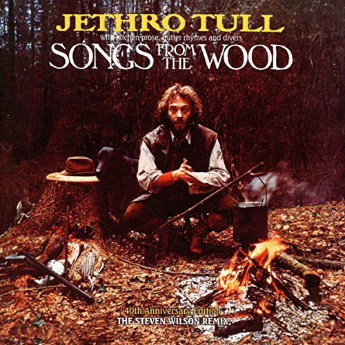 "Album cover of Jethro Tull's 'Songs from the Wood' featuring a man by a campfire."