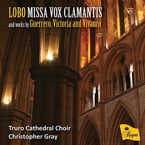 "CD cover featuring a cathedral interior with arched windows and lit columns."