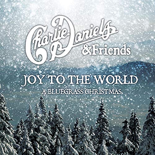 A snowy forest scene with the title "Charlie Daniels & Friends: Joy To The World".