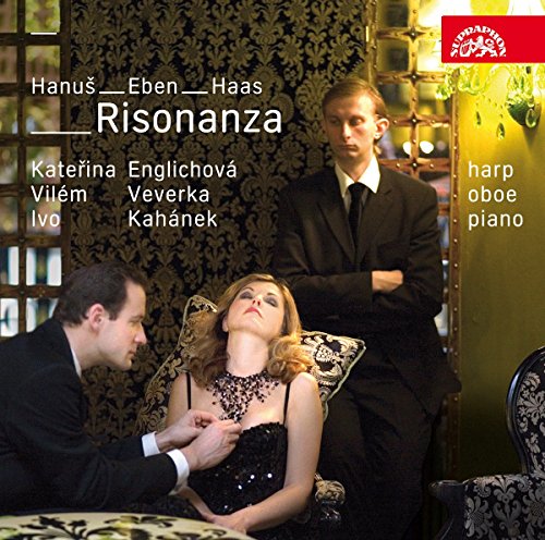 A CD cover featuring a woman and two men in formal attire.