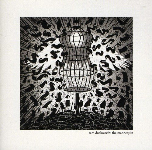 Album cover art featuring a black and white illustration of a mannequin exploding.