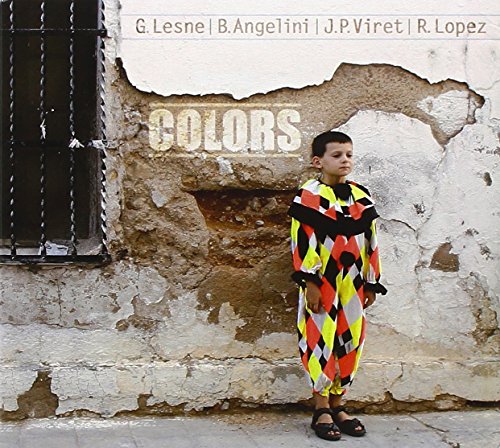 "Album cover with a man in colorful outfit standing against a worn wall."