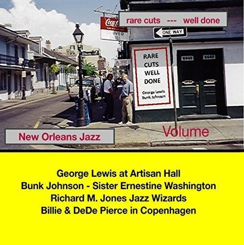 "CD cover with a street scene and yellow background listing jazz artists."