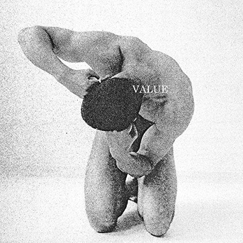 Black and white album cover featuring a kneeling, contorted human figure.