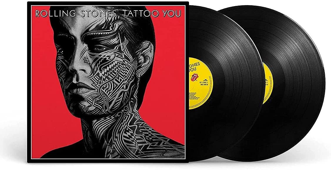 The Rolling Stones' "Tattoo You" vinyl album cover featuring a man with tribal face tattoos.