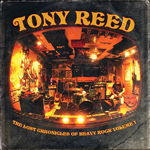 "Tony Reed album cover featuring a musician playing guitar in a dimly lit room."