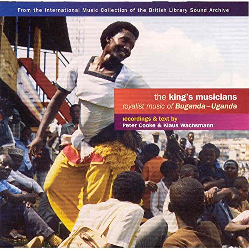 "CD cover with a man dancing in front of a crowd, text overlay."
