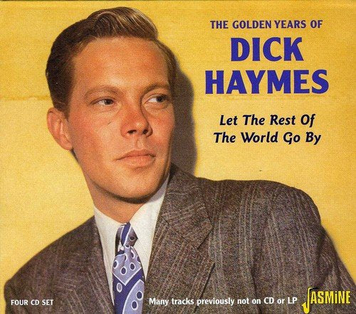 "CD cover featuring a man in a suit against a yellow background."