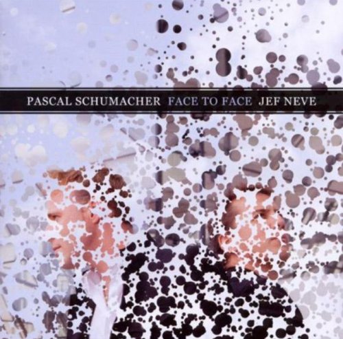 Album cover with two men's faces obscured by dots, artist names on a black banner.
