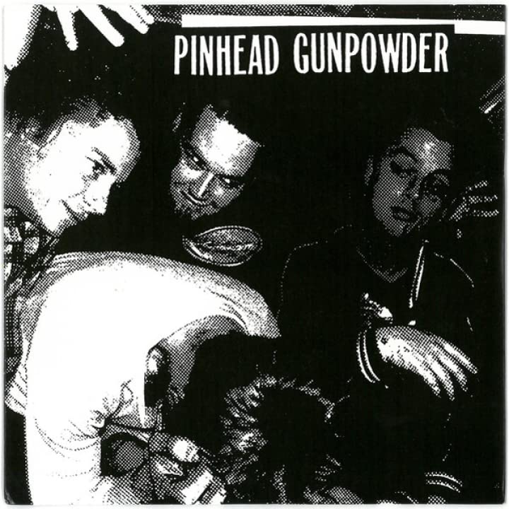 Black and white album cover featuring three people and band name.