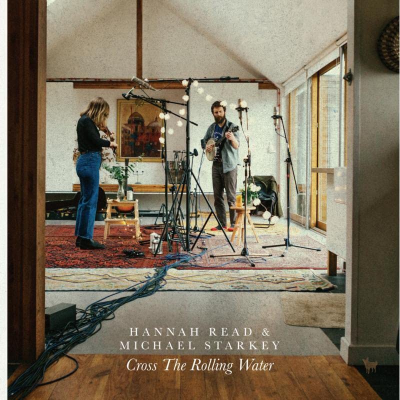 CD cover: two musicians performing with instruments in a room.