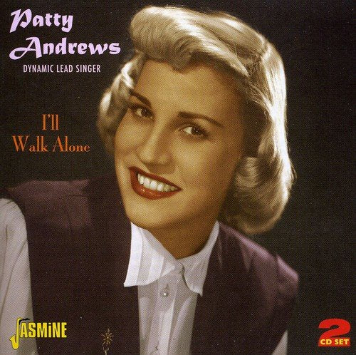 "CD cover featuring Patty Andrews with blonde hair, smiling, against a dark background."