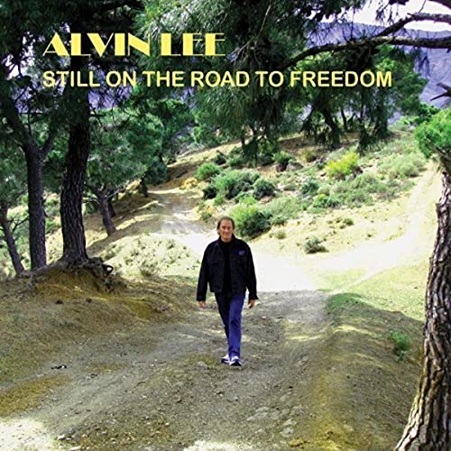 Alvin Lee album cover: man walking on a dirt road, trees.