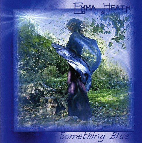 "Album cover: woman in flowing dress standing on a tree stump in a forest."