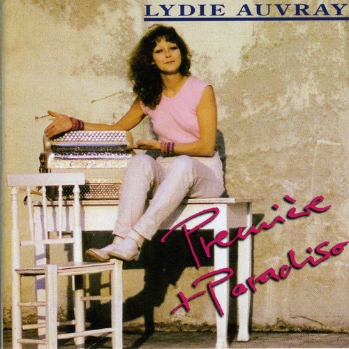 "Album cover with a woman sitting on a stool, holding an accordion."