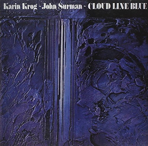 "Album cover with dark blue textured background and white artist and title text."