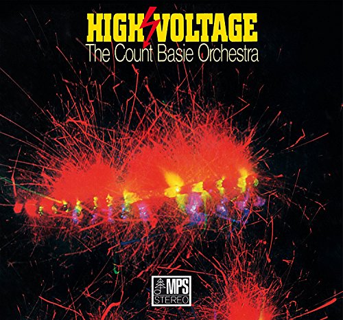 Vinyl album cover with "High Voltage" in yellow text and red sparks on a black background.