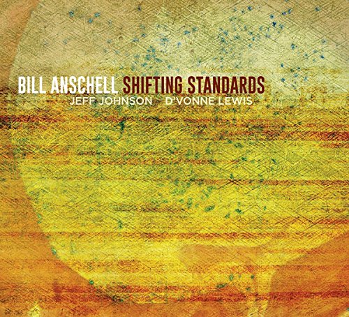 "Album cover with yellow, orange, and red abstract design and artist names."