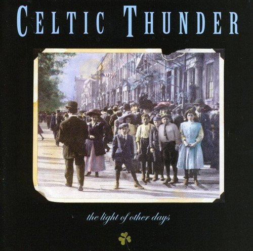 "CD cover with 'Celtic Thunder' title and vintage street scene image on black background."