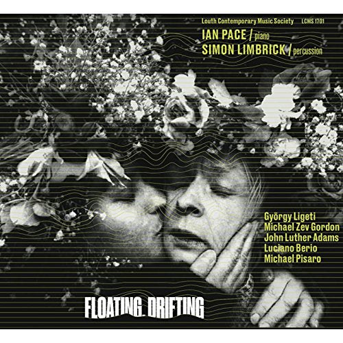 Black-and-white album cover with man and woman, surrounded by flowers and abstract lines.