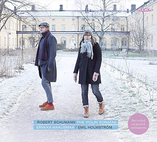 CD cover: two people standing in a frosty park before a building.