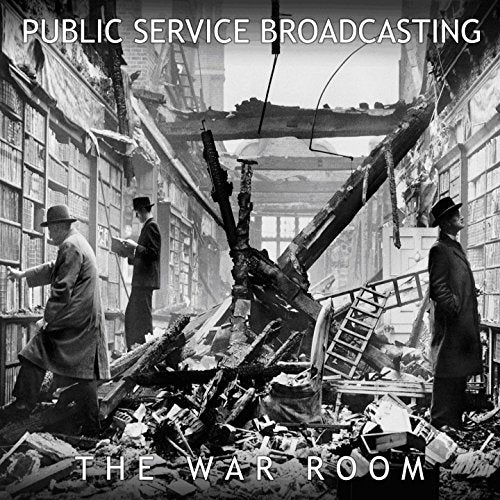 Black and white photo of men in a damaged library, album cover.