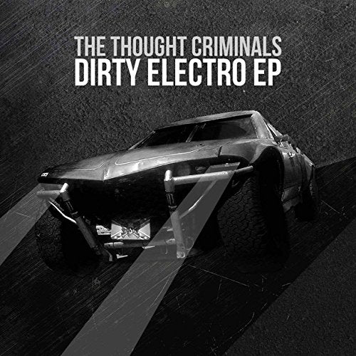 A vinyl record cover featuring a crashed car on a dark, textured surface.