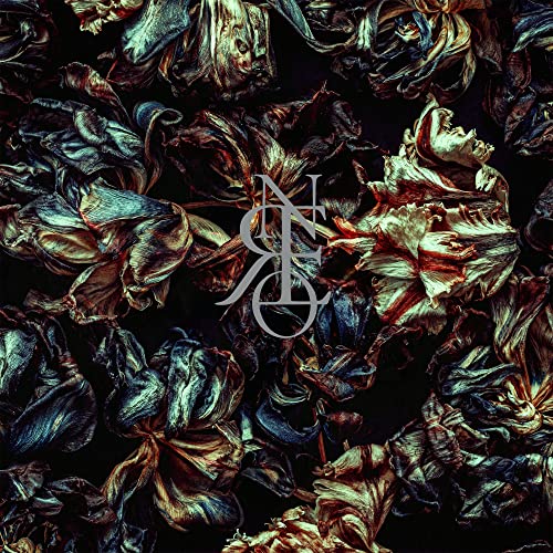 Dark floral pattern with a central, ornate silver "N" and "C" logo.